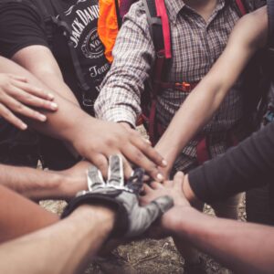 hands of walkers showing support